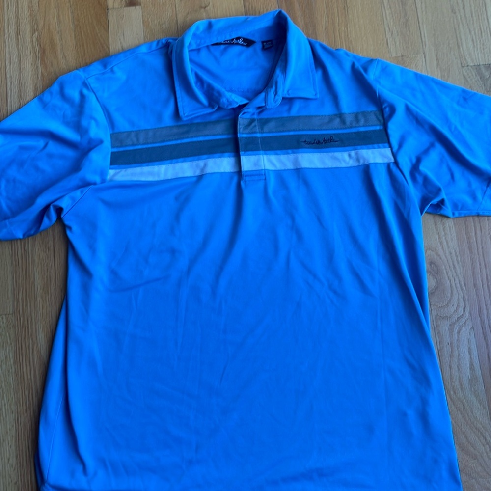 light blue travis matthew’s polo
